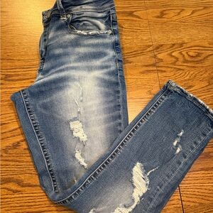 Buckle Black Distressed Blue Jeans